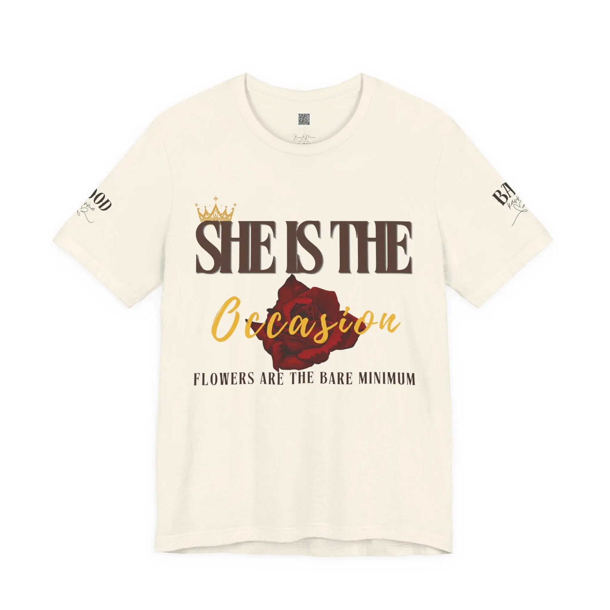 Soft pink "She Is The Occasion" women's T-shirt by Printify featuring empowering self-love message and luxury aesthetic.