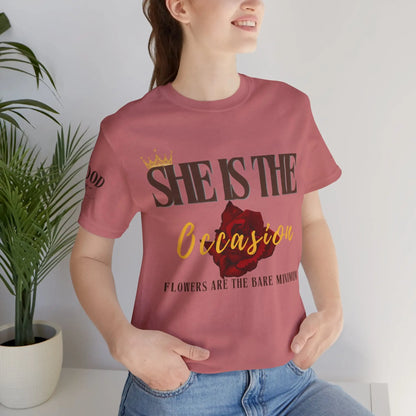 Pink "She Is The Occasion" women's T-shirt by Printify featuring empowering self-love motivational message in soft girl aesthetic style.