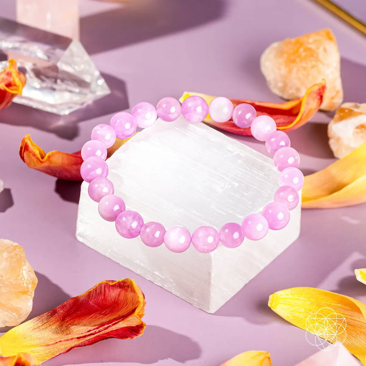Pink Kunzite bracelet from Conscious Items featuring polished, heart-shaped pink gemstones on a delicate bracelet.