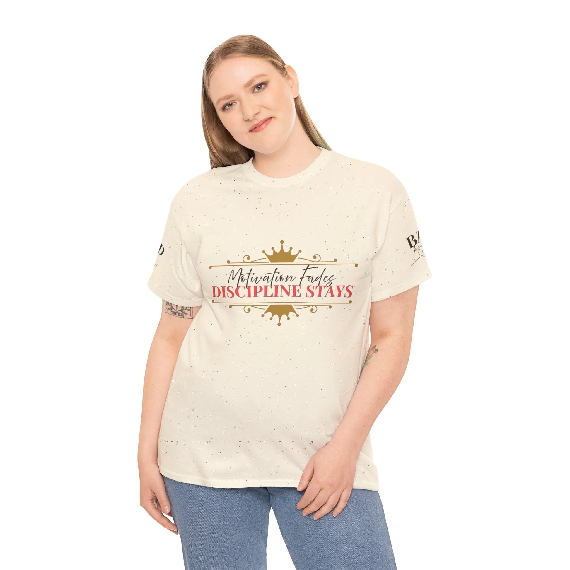 Women’s motivational graphic T-shirt with the phrase "Motivation Fades. Discipline Stays." in bold letters, from Printify.