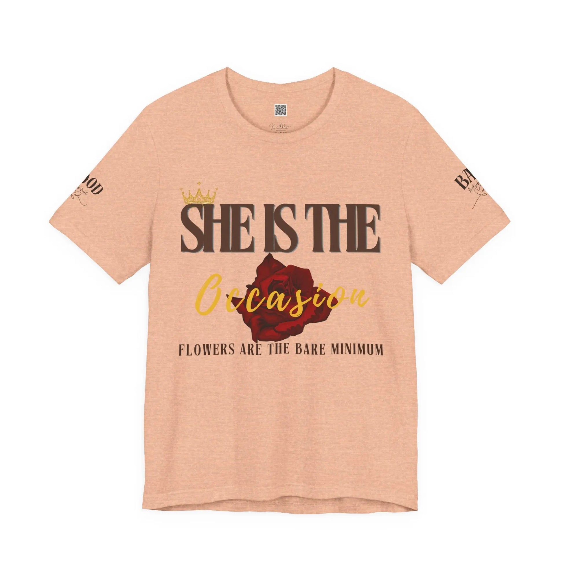 Soft pink "She Is The Occasion" women's motivational T-shirt by Printify, featuring empowering self-love message and luxurious aesthetic.