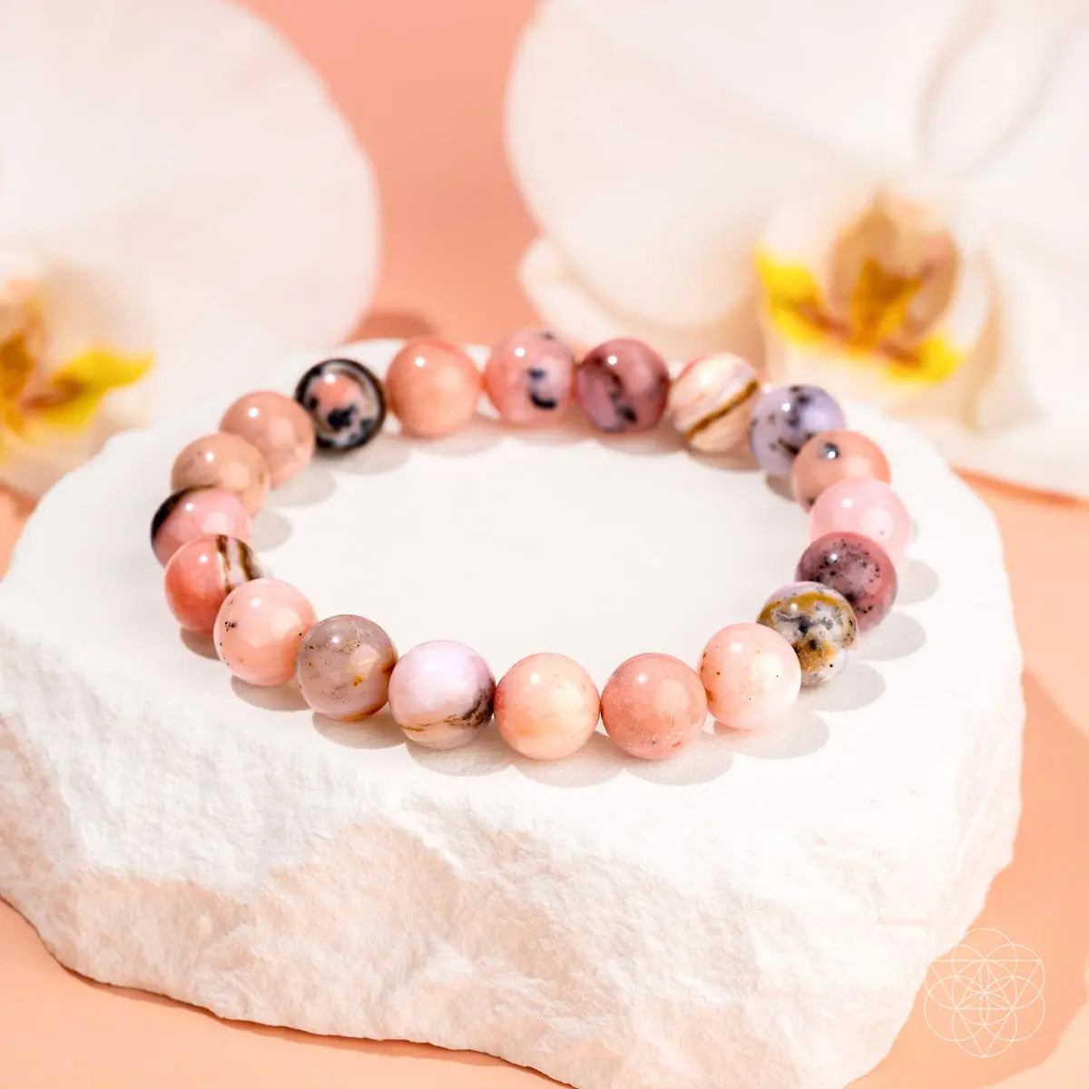 Peruvian Pink Opal bracelet from Conscious Items, featuring pink gemstone beads on a delicate stretch cord.