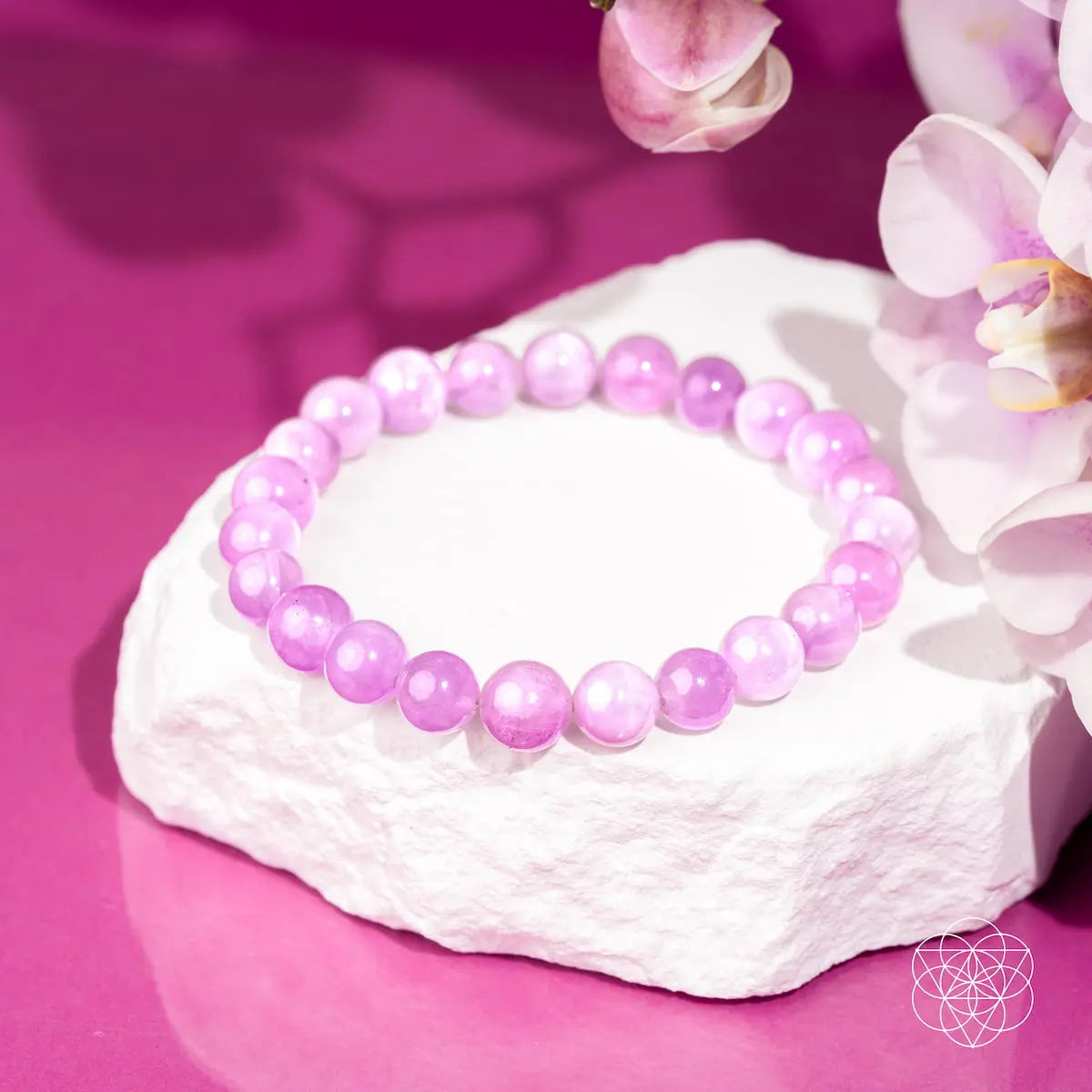 Pink Kunzite bracelet from Conscious Items with heart-shaped pink stones and silver clasp, showcasing elegant, polished jewelry.