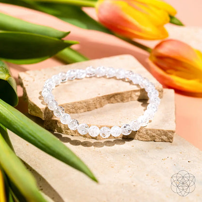 Conscious Items Emotional Ice Bath Quartz bracelet with 6mm beads, featuring polished clear quartz stones on a string.