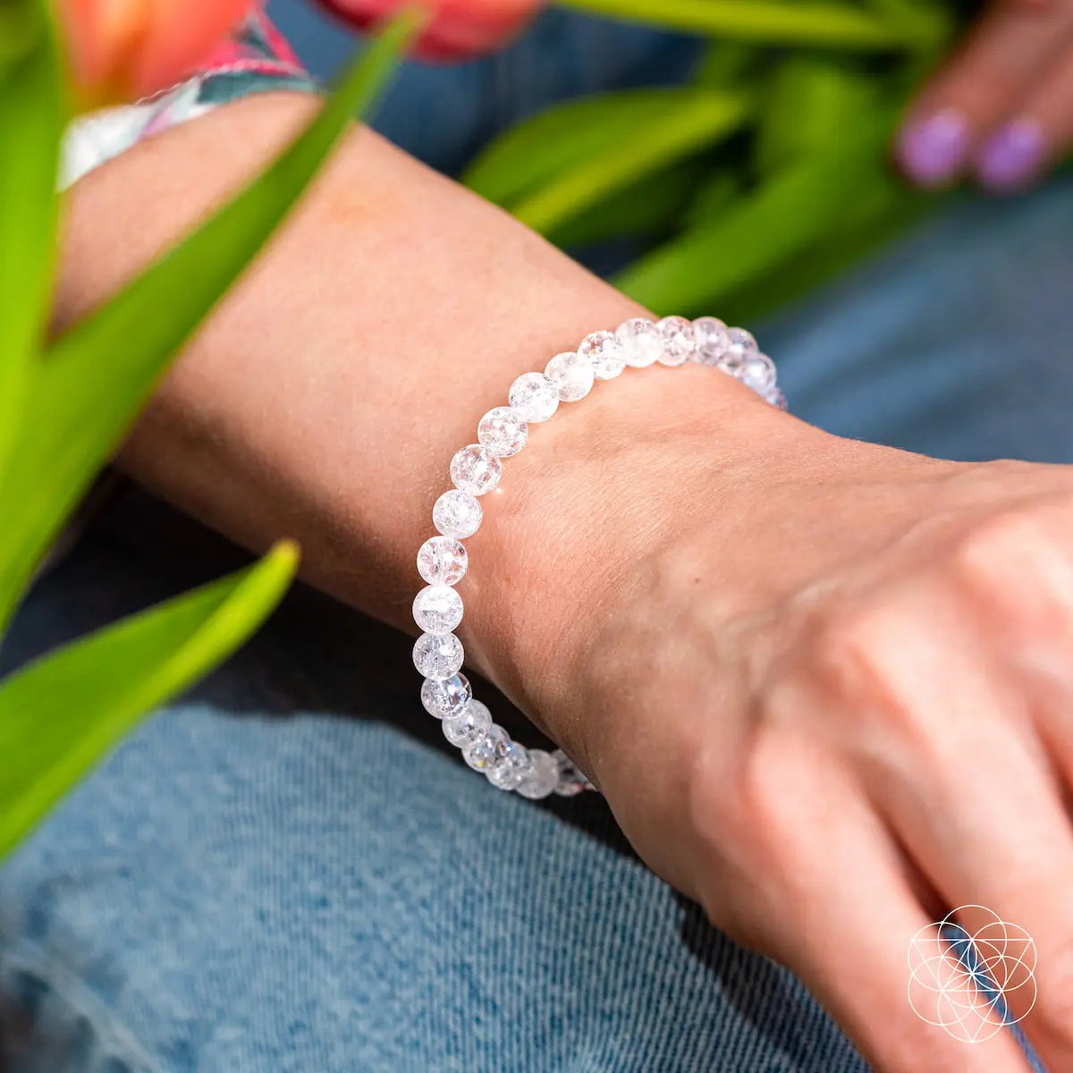 Conscious Items Emotional Ice Bath Quartz bracelet with 6mm beads, featuring clear ice quartz stones on a stretch bracelet.