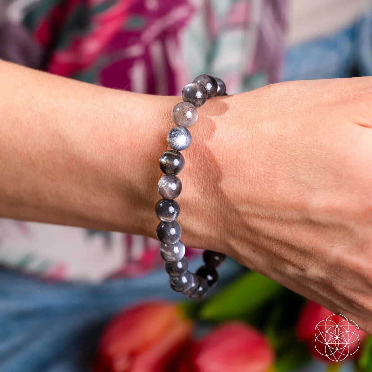 Black Moonstone bracelet from Conscious Items called The Empath’s Cord Cutter, featuring smooth, polished stones on a delicate cord.