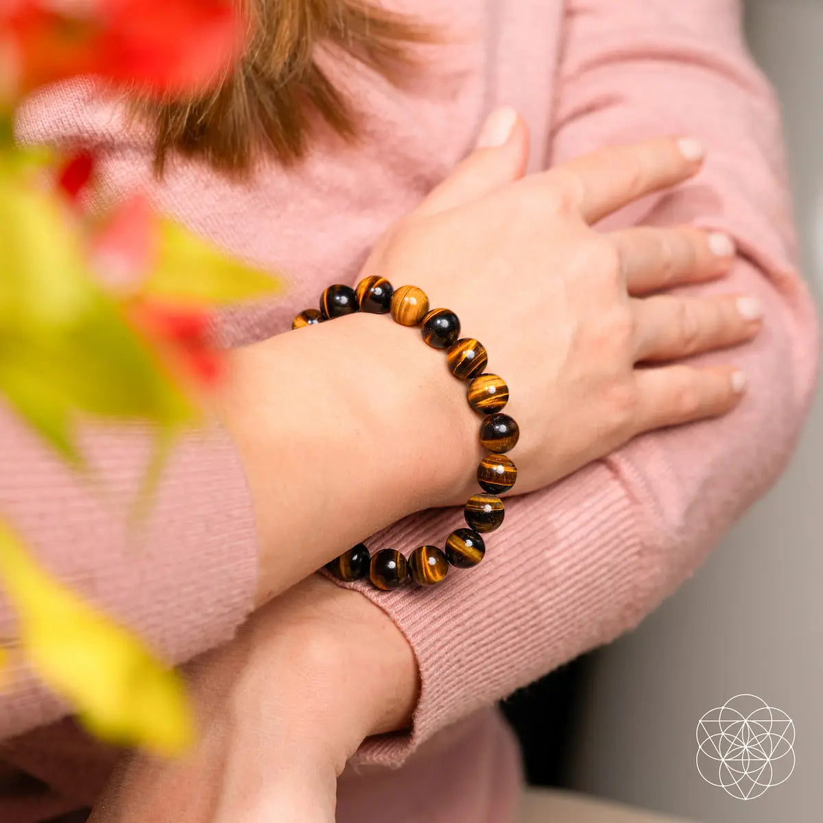 Conscious Items 7A Grade Tiger’s Eye bracelet with round beads, showcasing warm brown and gold tones, on a white background.