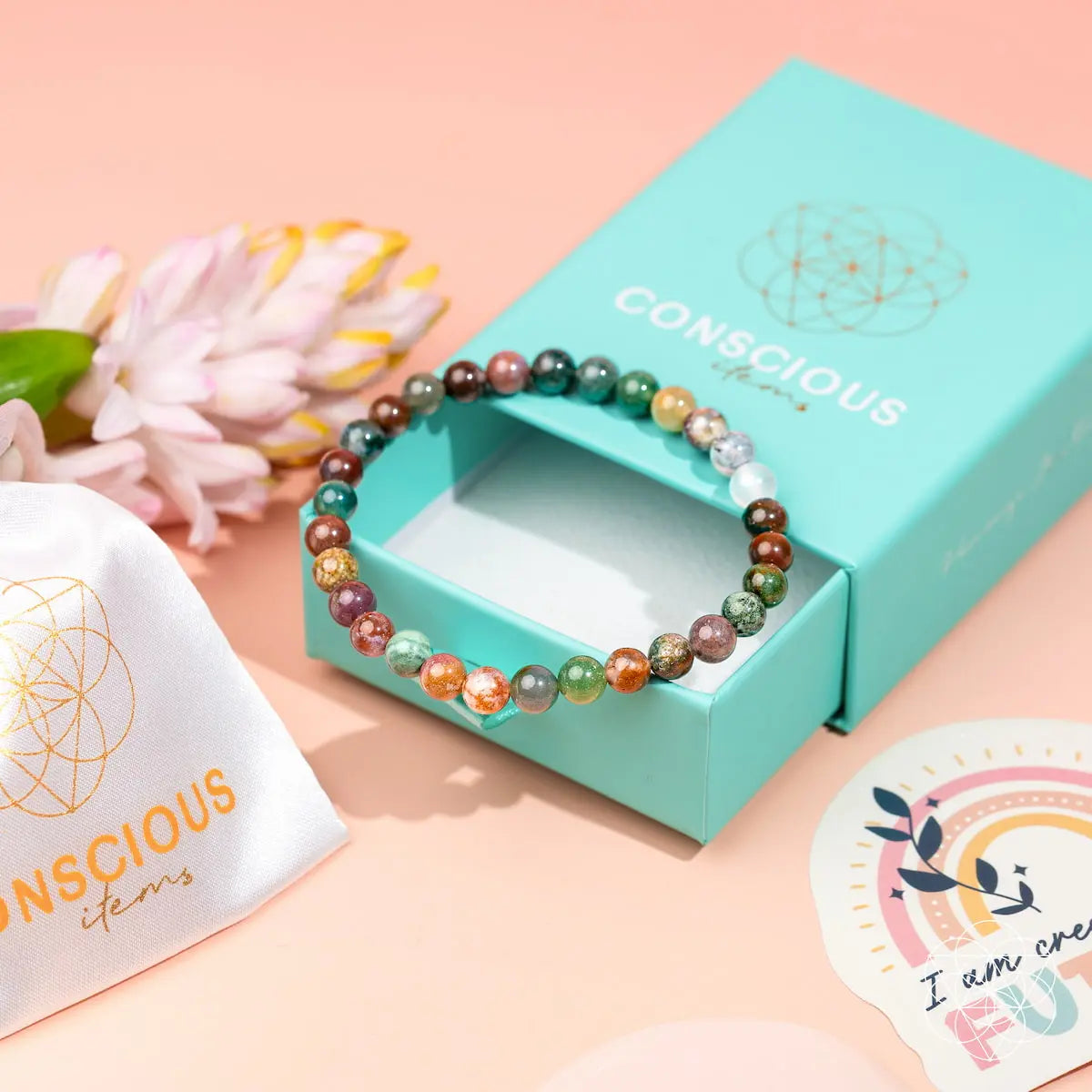 Conscious Items Energy Bracelet with 6mm beads, featuring natural stone design and adjustable cord for wrist comfort.