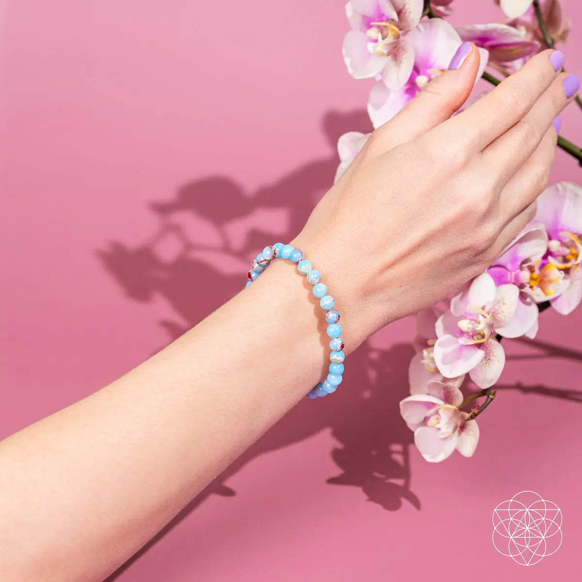 Aqua Terra Jasper bracelet by Conscious Items featuring 6mm beads, styled on a wrist with natural light highlighting its earthy tones.