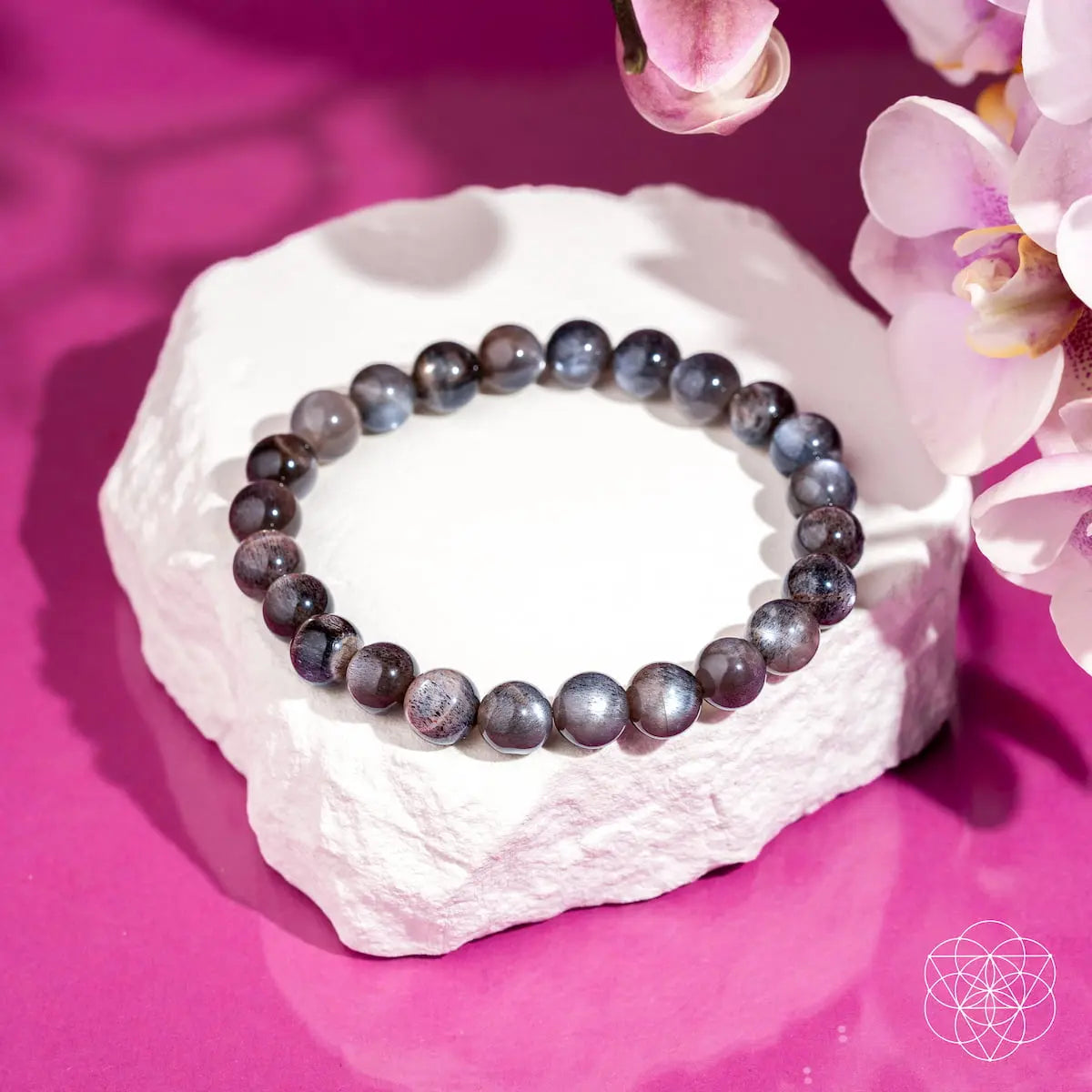 Black Moonstone bracelet from Conscious Items' The Empath’s Cord Cutter collection, featuring smooth, polished stones and adjustable cord.