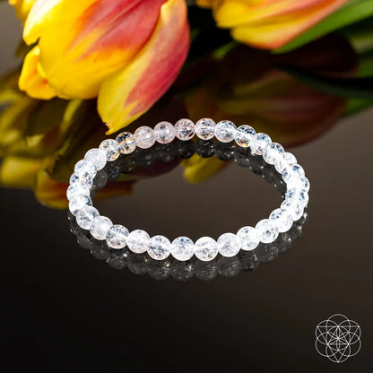 Conscious Items Emotional Ice Bath Quartz Bracelet with 6mm beads, featuring clear quartz stones on a stretchy cord.