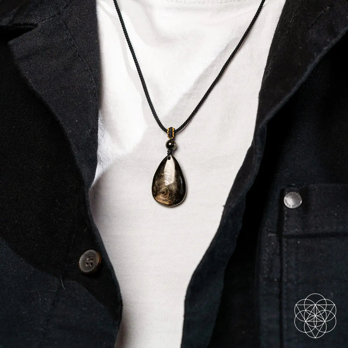 Hypersthene Millionaire Manifestation Pendant necklace by Conscious Items featuring a polished stone pendant on a chain.