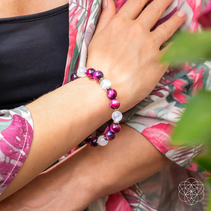 Pink galaxy tiger’s eye bracelet by Conscious Items featuring pink and tiger’s eye beads on a stylish bracelet design.