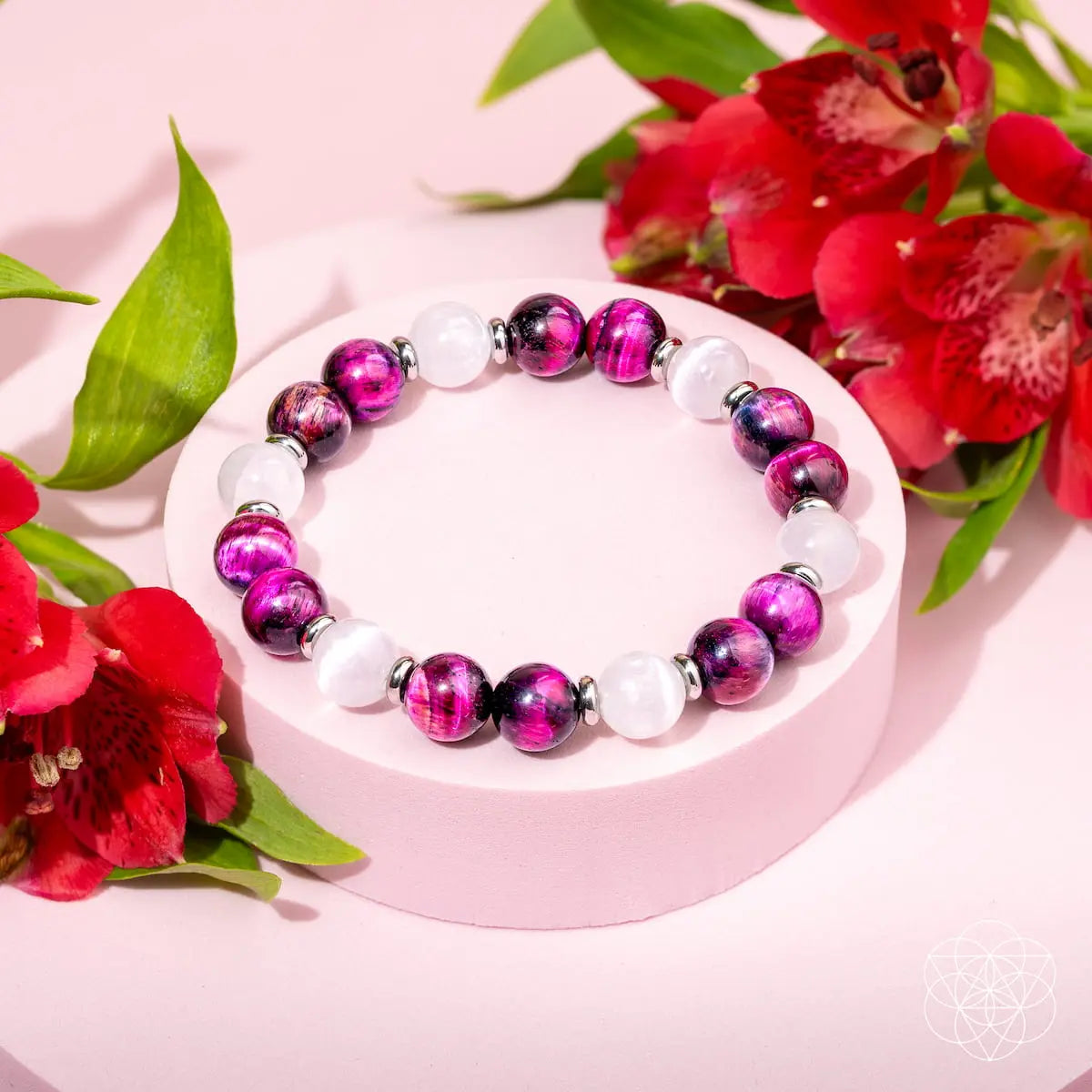 Pink Galaxy Tiger’s Eye bracelet from Conscious Items featuring pink and tiger’s eye beads on a stylish bracelet design.