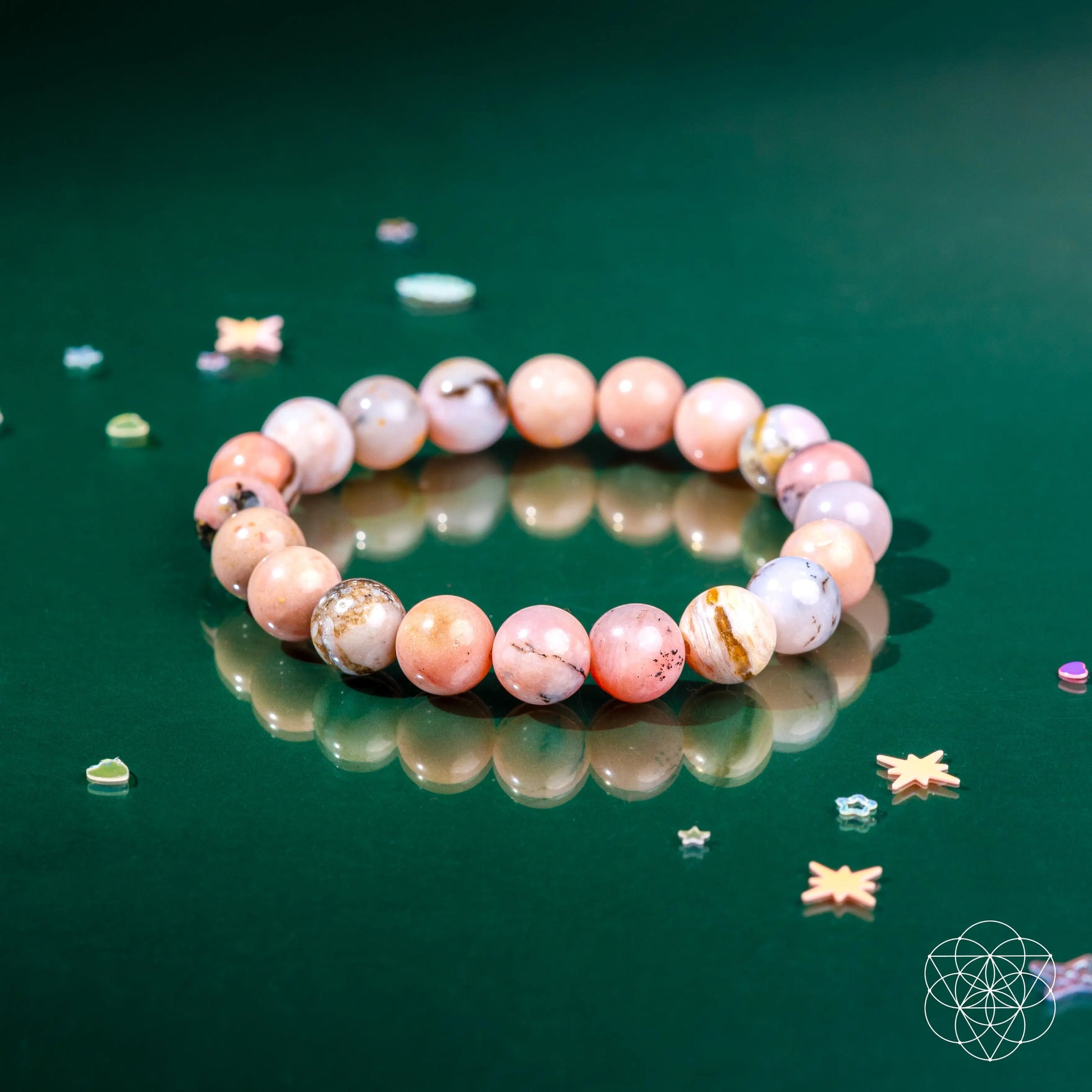 Peruvian Pink Opal bracelet by Conscious Items featuring pink gemstone beads on a delicate stretch cord.