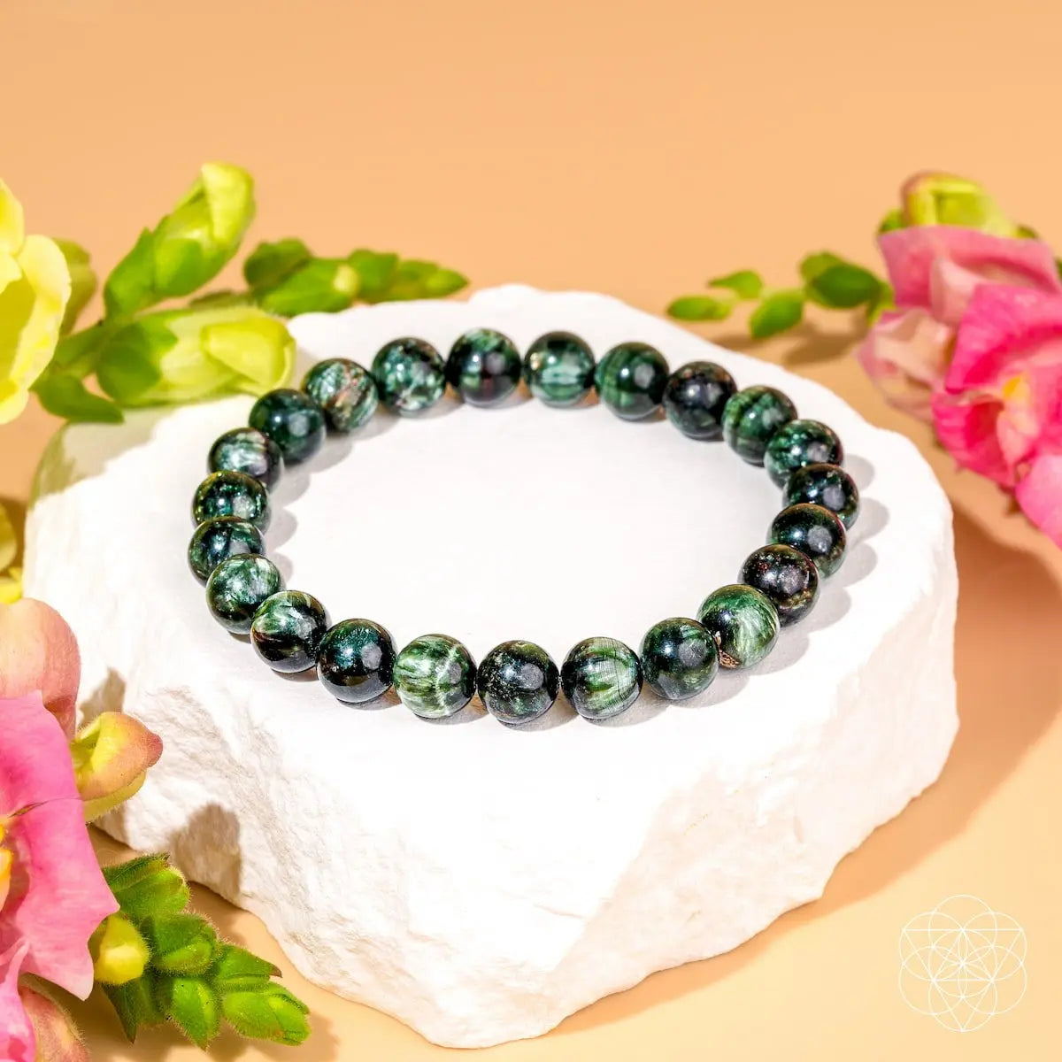 Seraphinite bracelet of transformation from Angel Energy by Conscious Items, featuring polished gemstone beads and silver accents.