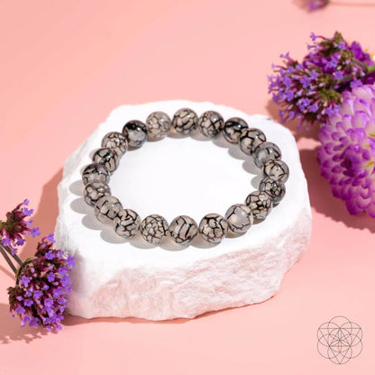 River agate bracelet from Conscious Items featuring smooth, natural stone beads for a calming, stylish accessory.