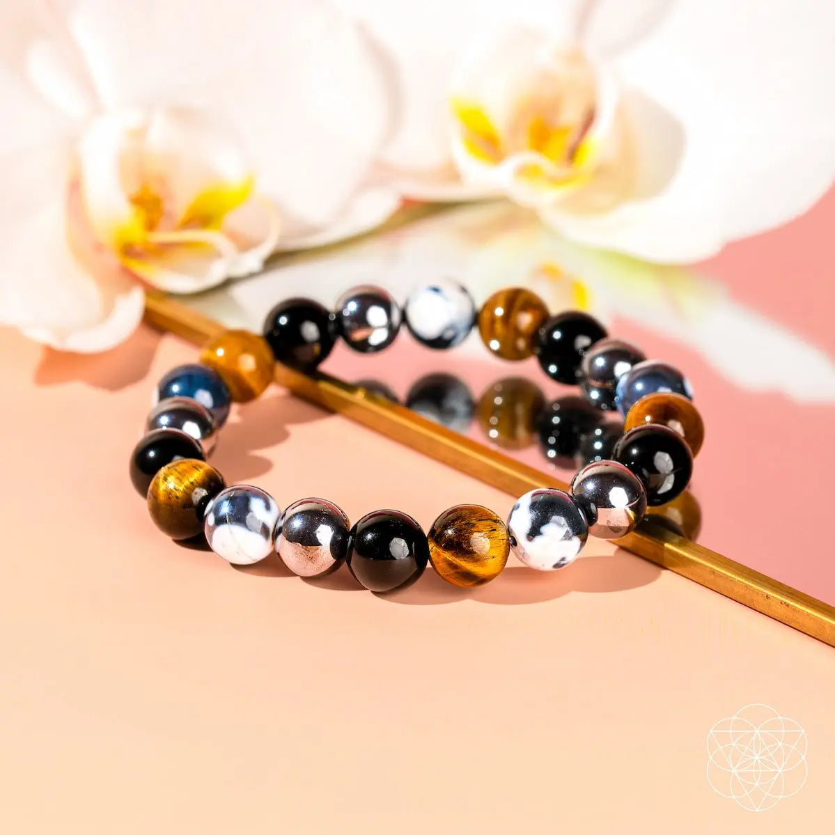 Conscious Items Orca's Armor bracelet featuring triple protection and healing design with black and silver beads.