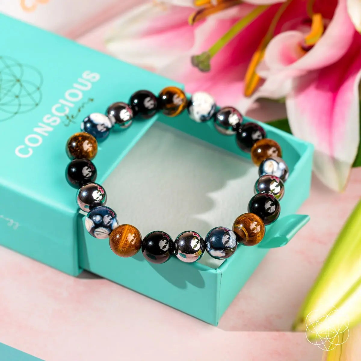 Conscious Items Orca’s Armor triple protection and healing bracelet featuring black and silver design with protective charms.