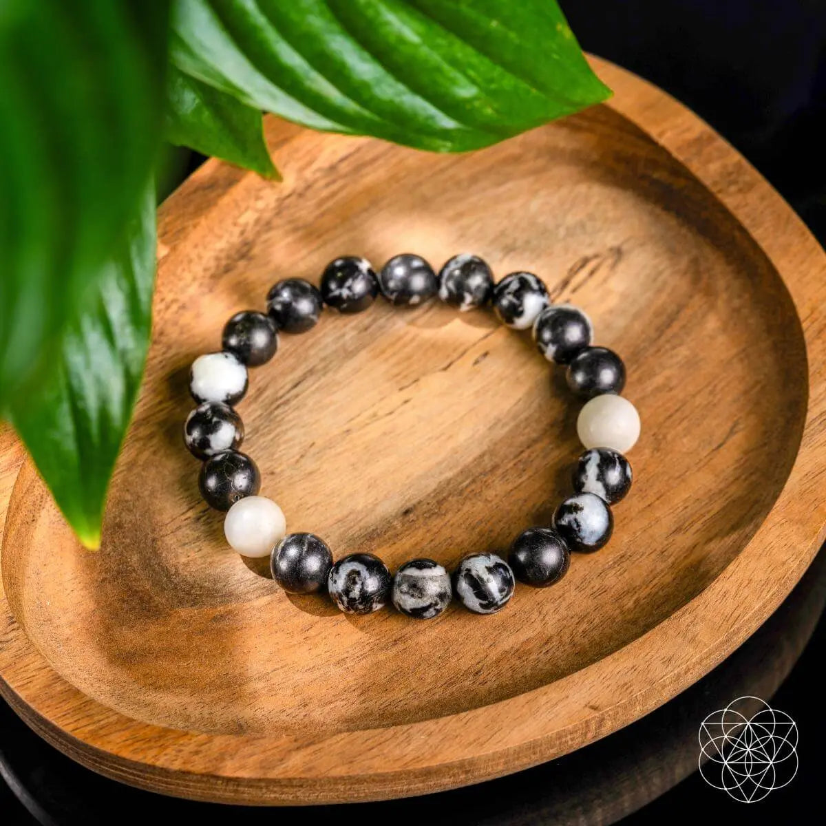 Zebra Jasper bracelet by Conscious Items featuring polished zebra-patterned stones on a sleek elastic band.