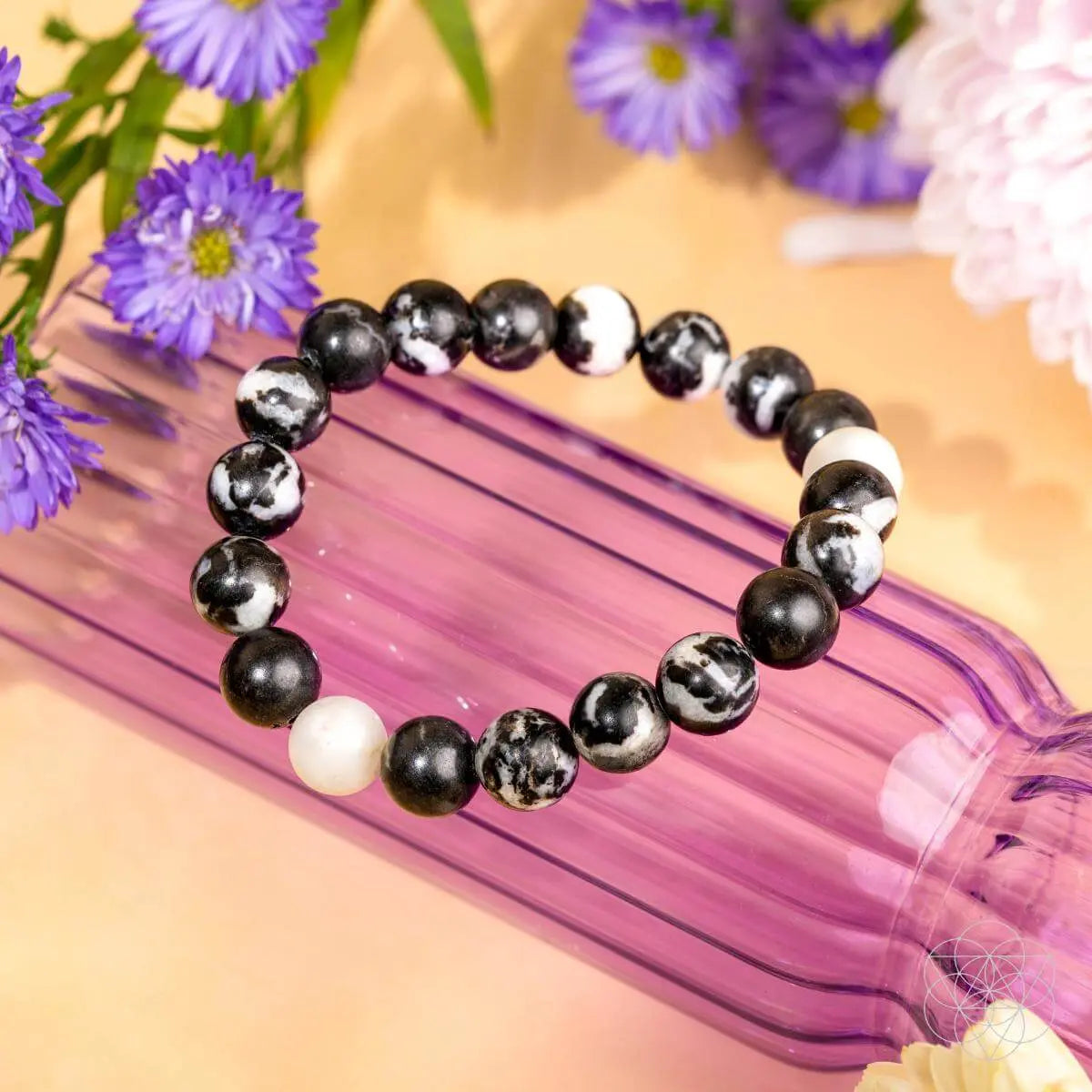Zebra Jasper bracelet from Conscious Items featuring black and white striped stones on a stretchy cord.